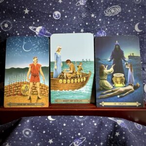 The tarot cards Nine of Wands, Eight of Pentacles and Death